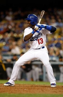LOS ANGELES, CA - SEPTEMBER 14:  Orlando Hudson #13 of the Los Angeles Dodgers bats against the Pittsburgh Pirates at Dodger Stadium on September 14, 2009 in Los Angeles, California.  (Photo by Jeff Gross/Getty Images)
