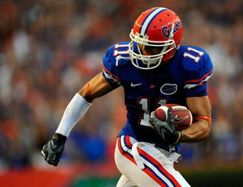 GAINESVILLE, FL - SEPTEMBER 05: Riley Cooper #11 of the Florida Gators runs for yardage during the game against the Charleston Southern Buccaneers at Ben Hill Griffin Stadium on September 5, 2009 in Gainesville, Florida. (Photo by Sam Greenwood/Getty Im