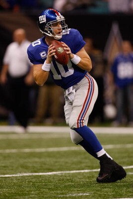 NEW ORLEANS - OCTOBER 18:  Eli Manning #10  of the New York Giants warms up prior to their NFL game against the New Orleans Saints at the Louisiana Superdome on October 18, 2009 in New Orleans, Louisiana.  (Photo by Chris Graythen/Getty Images)