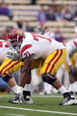 SEATTLE - SEPTEMBER 19: Charles Brown #71 of the USC Trojans gets ready at the line of scrimmage during the game against the Washington Huskies on September 19, 2009 at Husky Stadium in Seattle, Washington. The Huskies defeated the Trojans 16-13. (Photo b