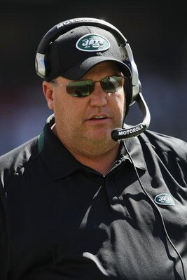 EAST RUTHERFORD, NJ - SEPTEMBER 20:  Head coach of the New York Jets, Rex Ryan looks on against the New England Patriots at Giants Stadium on September 20, 2009 in East Rutherford, New Jersey.  (Photo by Nick Laham/Getty Images)