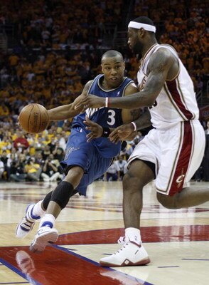 CLEVELAND - APRIL 30: Caron Butler #3 of the Washington Wizards drives around LeBron James #23 of the Cleveland Cavaliers to get to the basket for the winning shot in Game Five of the Eastern Conference Quarterfinals during the 2008 NBA Playoffs at Quicke