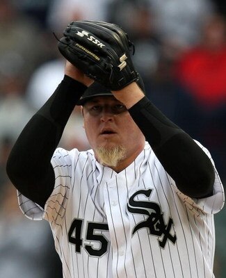 CHICAGO - APRIL 29: Bobby Jenks #45 of the Chicago White Sox winds up for a pitch in the ninth inning against the Seattle Mariners on April 29, 2009 at U.S. Cellular Field in Chicago, Illinois. The White Sox defeated the Mariners 6-3. (Photo by Jonathan D