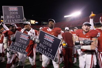 KANSAS CITY, MO - DECEMBER 06: Gerald McCoy #93 of the Oklahoma Sooners and teammates celebrate after the Sooners defeated the Missouri Tigers to win the Big 12 Championship game on December 6, 2008 at Arrowhead Stadium in Kansas City, Missouri. (Photo by