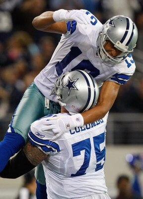 ARLINGTON, TX - OCTOBER 25:  Wide receiver Miles Austin #19 of the Dallas Cowboys celebrates a touchdown with Marc Colombo #75 against the Atlanta Falcons at Cowboys Stadium on October 25, 2009 in Arlington, Texas.  (Photo by Ronald Martinez/Getty Images)