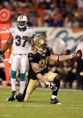 MIAMI - OCTOBER 25:  Tight end Jeremy Shockey #88 of the New Orleans Saints celebrates after making a first down reception over safety Yeremiah Bell #37 of the Miami Dolphins at Land Shark Stadium on October 25, 2009 in Miami, Florida. The Saints defeated