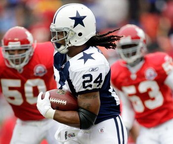 KANSAS CITY, MO - OCTOBER 11:  Running back Marion Barber #24 of the Dallas Cowboys carries the ball upfield during the game against the Kansas City Chiefs on October 11, 2009 at Arrowhead Stadium in Kansas City, Missouri.  (Photo by Jamie Squire/Getty Im