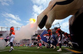 DENVER - OCTOBER 04:  The Denver Broncos take the field during player introductions prior to facing the Dallas Cowboys during NFL action at Invesco Field at Mile High on October 4, 2009 in Denver, Colorado. The Broncos defeated the Cowboys 17-10.  (Photo 