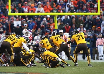 DENVER - OCTOBER 11:  Matt Prater #5 of the Denver Broncos kicks the game winning field goal in overtime against the New England Patriots during an NFL game at Invesco Field at Mile High on October 11, 2009 in Denver, Colorado.  (Photo by Jed Jacobsohn/Ge
