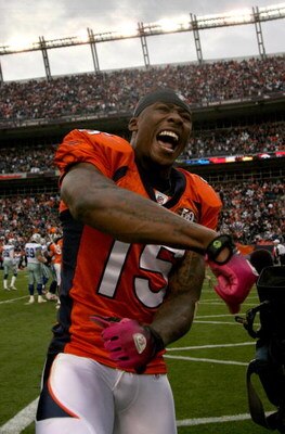 DENVER - OCTOBER 04:  Brandon Marshall #15 of the Denver Broncos celebrates after the final play against the Dallas Cowboys during NFL action at Invesco Field at Mile High on October 4, 2009 in Denver, Colorado. Marshall caught a game winning 51 yard rece