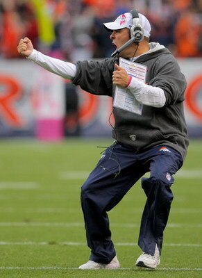 DENVER - OCTOBER 04:  Head coach Josh McDaniels of the Denver Broncos celebrates after Brandon Marshall caught the game winning 51 yard touchdown reception against the Dallas Cowboys with 2:47 remaining in the fourth quarter during NFL action at Invesco F