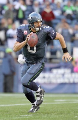 SEATTLE - OCTOBER 18:  Quarterback Matt Hasselbeck #8 of the Seattle Seahawks moves to pass the ball during the game against the Arizona Cardinals on October 18, 2009 at Qwest Field in Seattle, Washington. (Photo by Otto Greule Jr/Getty Images) 