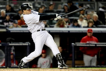 NEW YORK - OCTOBER 17:  Mark Teixeira #25 of the New York Yankees hits a single in the bottom of the sixth inning against the Los Angeles Angels of Anaheim in Game Two of the ALCS during the 2009 MLB Playoffs at Yankee Stadium on October 17, 2009 in the B