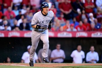 ANAHEIM, CA - OCTOBER 22:  Hideki Matsui #55 of the New York Yankees runs to first in Game Five of the ALCS against the Los Angeles Angels of Anaheim during the 2009 MLB Playoffs at Angel Stadium on October 22, 2009 in Anaheim, California.  (Photo by Kevo