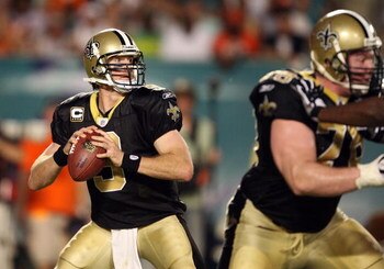 MIAMI - OCTOBER 25:  Quarterback Drew Brees #9 of the New Orleans Saints drops back to pass against the Miami Dolphins at Land Shark Stadium on October 25, 2009 in Miami, Florida. The Saints defeated the Dolphins 46-34.  (Photo by Doug Benc/Getty Images)