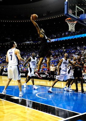 ORLANDO, FL - APRIL 28:  Andre Iguodala #9 of the Philadelphia 76ers dunks against the Orlando Magic in Game Five of the Eastern Conference Quarterfinals during the 2009 NBA Playoffs at Amway Arena on April 28, 2009 in Orlando, Florida. NOTE TO USER: User