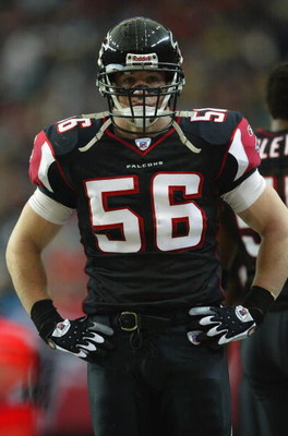 ATLANTA - DECEMBER 28: Linebacker Keith Brooking #56 of the Atlanta Falcons stands on the field during the game against the Jacksonville Jaguars at the Georgia Dome on December 28, 2003 in Atlanta, Georgia. The Falcons defeated the Jaguars 21-14. (Phot