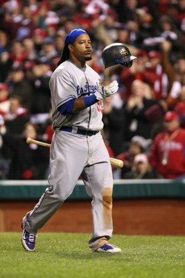 PHILADELPHIA - OCTOBER 18:  Manny Ramirez #99 of the Los Angeles Dodgers walks back to the dugout during their game against the Philadelphia Phillies in Game Three of the NLCS during the 2009 MLB Playoffs at Citizens Bank Park on October 18, 2009 in Phila