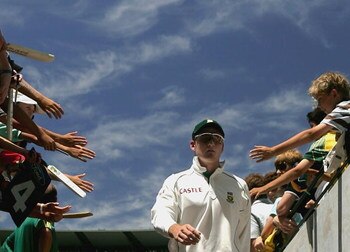 MELBOURNE, AUSTRALIA - DECEMBER 29:  (EDITORS NOTE: An on camera polarizing filter has been used in the creation of this image) Graeme Smith of South Africa leads his team from the field during day four of the Second Test between Australia and South Afric