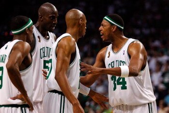 BOSTON - JUNE 17:  (L-R) Rajon Rondo #9, Kevin Garnett #5 and Ray Allen #20 listen to teammate Paul Pierce #34 of the Boston Celtics in the third quarter of Game Six of the 2008 NBA Finals against the Los Angeles Lakers on June 17, 2008 at TD Banknorth Ga
