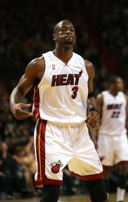 MIAMI - APRIL 25:  Dwyane Wade #3 of the Miami Heat celebrates after making a three-pointer against the Atlanta Hawks during Game Three of the Eastern Conference Quarterfinals at American Airlines Arena on April 25, 2009 in Miami, Florida. The Heat defeat