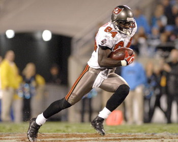 Tampa Bay Buccaneers wide receiver Joey Galloway grabs a midfield pass against the Carolina Panthers  on ESPN Monday Night Football Nov. 13, 2006 in Charlotte.  The Panthers won 24 - 10.  (Photo by Al Messerschmidt/Getty Images)
