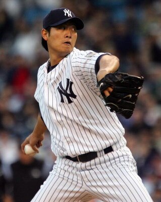 NEW YORK - APRIL 16:  Chien-Ming Wang #40 of the New York Yankees delivers a pitch against the Boston Red Sox on April 16, 2008 at Yankee Stadium in the Bronx borough of New York City.  (Photo by Jim McIsaac/Getty Images)