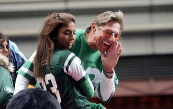 NEW YORK - NOVEMBER 25:  Football star Joe Namath yells to the crowd as he passes on a float in Times Square during the 78th Annual Macy's Thanksgiving Day Parade November 25, 2004 in New York City. Thousands attended the parade which featured 15 giant ch