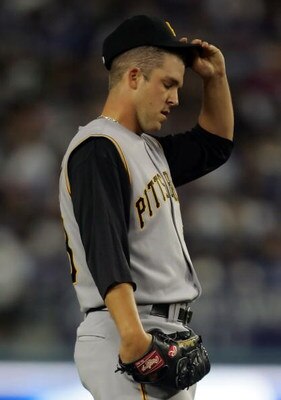 LOS ANGELES, CA - APRIL 16:  Pitcher Paul Maholm #28 of the Pittsburgh Pirates reacts after giving up a bunt to Juan Pierre of the Los Angeles Dodgers in the first inning at Dodger Stadium on April 16, 2008 in Los Angeles, California.  (Photo by Jeff Gros