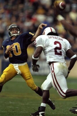 21 Nov 1998:  Quarterback Justin Vedder #10 of the California Golden Bears in action against linebacker Donnie Spragan #2 of the Stanford Cardinal during the game at the Memorial Stadium in Berkeley, California. The Cardinal defeated the Golden Bears 10-3