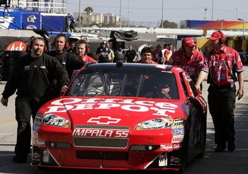 DAYTONA BEACH, FL - FEBRUARY 07:  Crew of the #14 Office Depot/Old Spice Chevrolet driven by Tony Stewart during practice for the NASCAR Sprint Cup Series Daytona 500 at Daytona International Speedway on February 7, 2009 in Daytona Beach, Florida.  (Photo