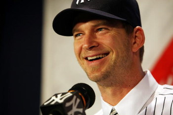 NEW YORK - DECEMBER 18:  A.J. Burnett talks to the media during a press conference to announce his signing to the New York Yankees at Yankee Stadium on December 18, 2008  in the Bronx borough of New York City.  (Photo by Nick Laham/Getty Images)