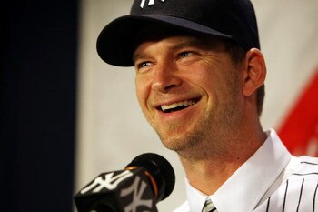 NEW YORK - DECEMBER 18:  A.J. Burnett talks to the media during a press conference to announce his signing to the New York Yankees at Yankee Stadium on December 18, 2008  in the Bronx borough of New York City.  (Photo by Nick Laham/Getty Images)