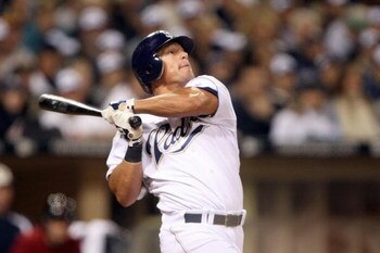 SAN DIEGO - MARCH 31: Brian Giles #24 of the San Diego Padres follows his hit during the Opening Day game against the Houston Astros  on March 31, 2008 at Petco Park in San Diego, California. (Photo by: Stephen Dunn/Getty Images)