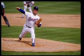 Mar 1992:  Pitcher Nolan Ryan of the Texas Rangers winds up for the pitch during spring training. Mandatory Credit: Jonathan Daniel  /Allsport