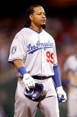 PHILADELPHIA - OCTOBER 10:  Manny Ramirez #99 of the Los Angeles Dodgers walks off the field after the Philadelphia Phillies won Game Two of the National League Championship Series 8-5 during the 2008 MLB playoffs on October 10, 2008 at Citizens Bank Ball