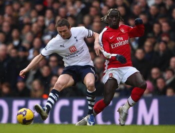 LONDON - FEBRUARY 08:  Robbie Keane of Tottenham is challenged by Bacary Sagna of Arsenal during the Barclays Premier League match between Tottenham Hotspur and Arsenal at White Hart Lane on February 8, 2009 in London, England.  (Photo by Mike Hewitt/Gett