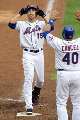 NEW YORK - SEPTEMBER 28:  Carlos Beltran #15 celebrats with Robinson Cancel #40 of the New York Mets after hitting a two run home run against the Florida Marlins during the last regular season baseball game ever played in Shea Stadium on September 28, 200
