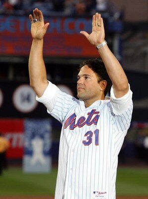 NEW YORK - SEPTEMBER 28: Former New York Met Mike Piazza waves to the crowd during post game ceremoies after the Mets played the Florida Marlins in the last regular season baseball game ever played in Shea Stadium on September 28, 2008 in the Flushing nei