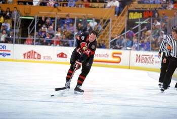 BUFFALO, NY - NOVEMBER 27:  Defense Brad Marsh #14 of the Ottawa Senators warms up prior to a game against the Buffalo Sabres on November 27, 1992 at Memorial Auditorium in Buffalo, New York.  (Photo by Rick Stewart/Getty Images)