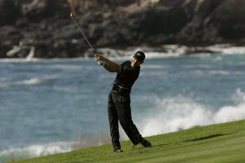 PEBBLE BEACH, CA - FEBRUARY 12:  Mike Weir hits a shot during the final round of the AT&T Pro Am on February 12, 2006 at the Pebble Beach Golf Links Golf Course in Pebble Beach, California.  (Photo by Stephen Dunn/Getty Images)