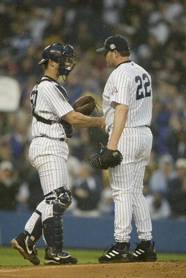 BRONX, NY - JUNE 13:  Catcher Jorge Posada #20 of the New York Yankees congratulates pitcher Roger Clemens #22 after Clemens recorded his 4000th strikeout, which happened to be against shortstop Edgar Renteria #3 of the St. Louis Cardinals, during the int