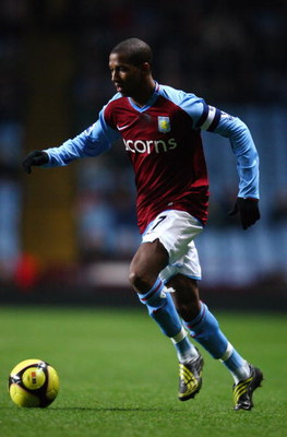 BIRMINGHAM, UNITED KINGDOM - FEBRUARY 04:  Ashley Young of Aston Villa runs with the ball during the F.A Cup sponsored by E.on 4th round replay match between Aston Villa and Doncaster Rovers at Villa Park on February 4, 2009 in Birmingham, England.  (Phot