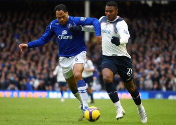 LIVERPOOL, UNITED KINGDOM - FEBRUARY 07:  Ariza Makukula of Bolton battles with Joleon Lescott of Everton during the Barclays Premier League match between Everton and Bolton at Goodison Park on February 7, 2009 in Liverpool, England.  (Photo by Jamie McDo