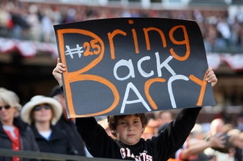 SAN FRANCISCO - APRIL 7:  A young San Francisco Giants fan holds a sign imploring the Giants to Bring Back Barry (Bonds) during the opening day game against the San Diego Padres on April 7, 2008 at AT&T Park in San Francisco, California. The Padres defeat