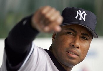 BALTIMORE - JUNE 03:  Bernie Williams #51 of the New York Yankees greets fans from the dugout prior to the game against the Baltimore Orioles on June 3, 2006 at Oriole Park at Camden Yards in Baltimore, Maryland. The Yankees defeated the Orioles 6-5 in 10