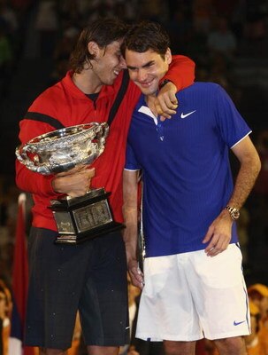 MELBOURNE, AUSTRALIA - FEBRUARY 01:  Rafael Nadal of Spain consoles Roger Federer of Switzerland during the trophy presentation after his men's final match during day fourteen of the 2009 Australian Open at Melbourne Park on  February 1, 2009 in Melbourne