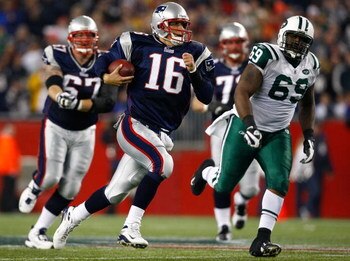 FOXBORO, MA - NOVEMBER 13:  Matt Cassel #16 of the New England Patriots is chased by C.J. Mosley #69 of the New York Jets at Gillette Stadium on November 13, 2008 in Foxboro, Massachusetts. The Jets won 34-31 in overtime. (Photo by Jim Rogash/Getty Images