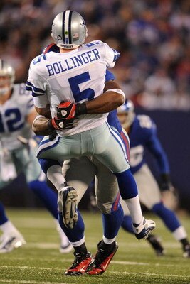 EAST RUTHERFORD, NJ - NOVEMBER 02:  Justin Tuck #91 of the New York Giants sacks Brooks Bollinger #5 of the Dallas Cowboys during their game on November 2, 2008 at Giants Stadium in East Rutherford, New Jersey.  (Photo by Al Bello/Getty Images)