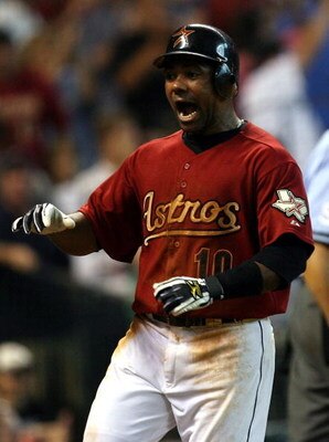 HOUSTON - JUNE 29:  Miguel Tejada #10 of the Houston Astros reacts after scoring a run against the Boston Red Sox in the 8th inning during Interleague MLB action on June 29, 2008 at Minute Maid Park in Houston, Texas.  (Photo by Ronald Martinez/Getty Imag